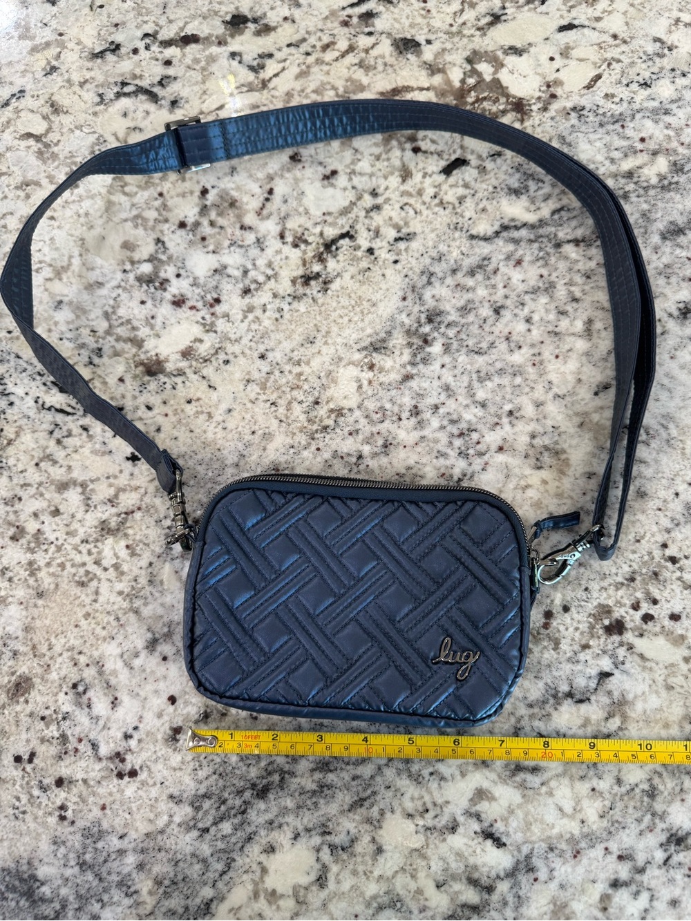 lug Coupe Quilted Crossbody Bag in metallic Navy Blue